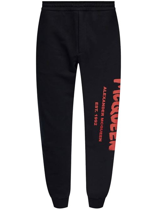 Pantaloni in jersey di cotone nero/rosso stampa logo ALEXANDER MCQUEEN | 688714QTAAB0509